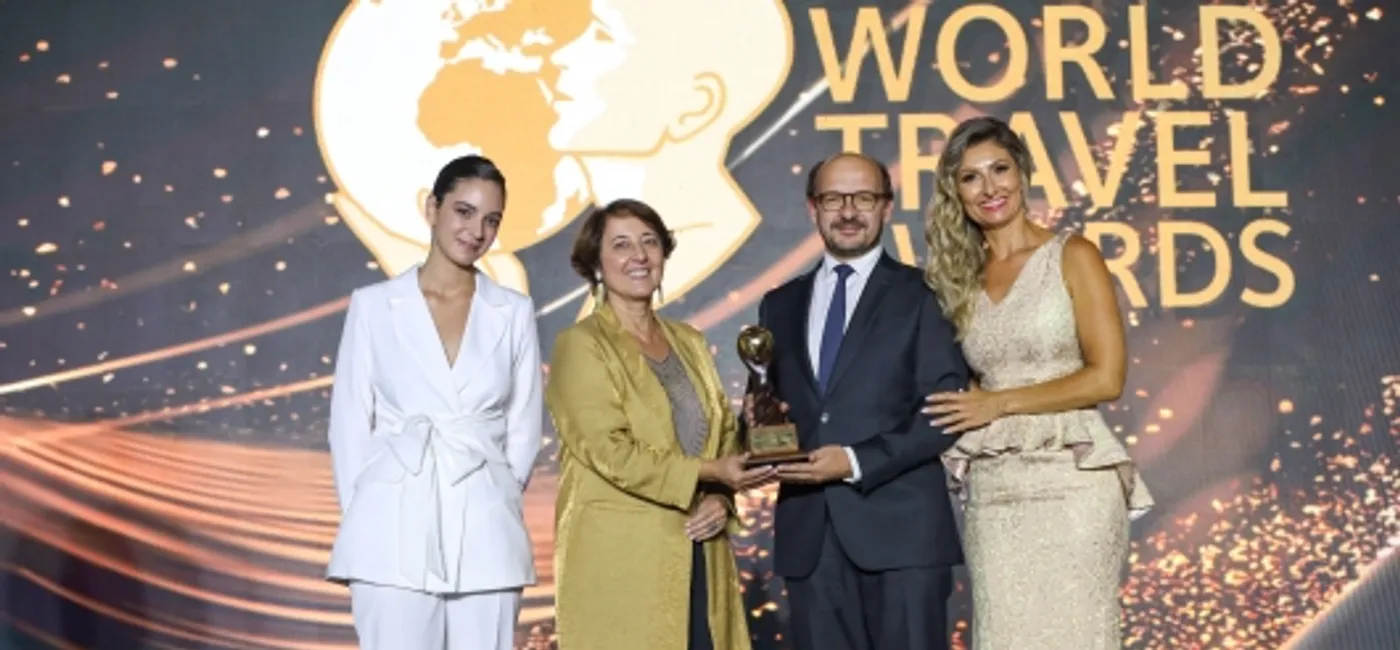 Image: Secretary of State for Tourism, Commerce and Services, Nuno Fazenda accepts the award along with Lídia Monteiro, Board Member for Portugal Tourist Board. (Photo Credit: Visit Portugal)